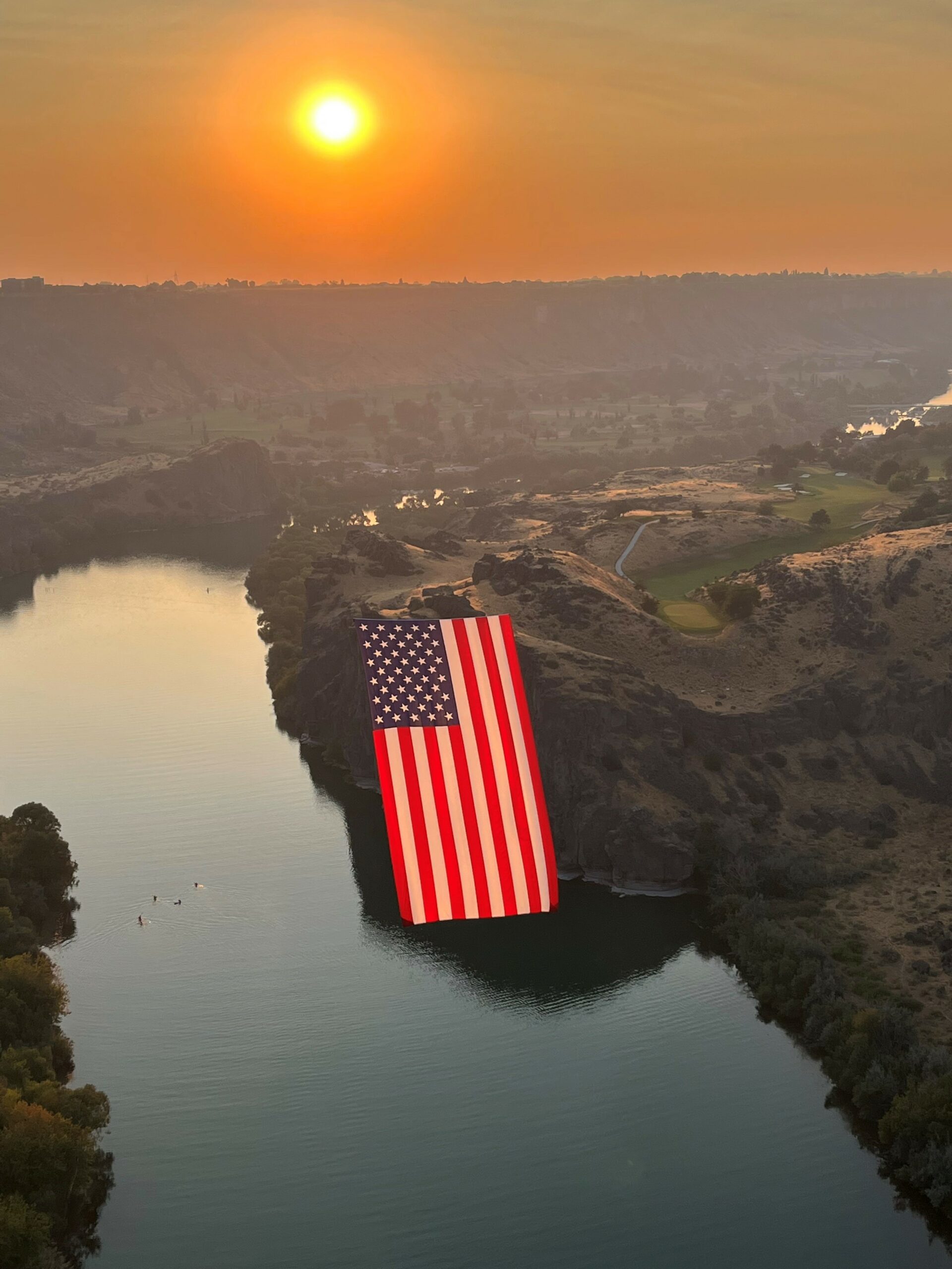 Photo: American Flag suspended above the Snake River Canyon by Tedi Thompson